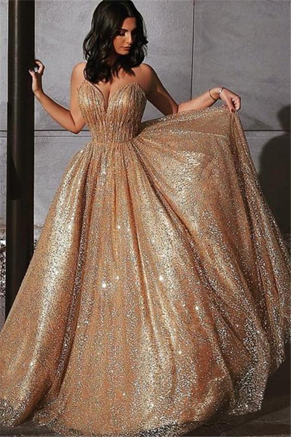 Champagne Elgant A-line Spaghetti-Strapss Backless Sequins Prom Dresses