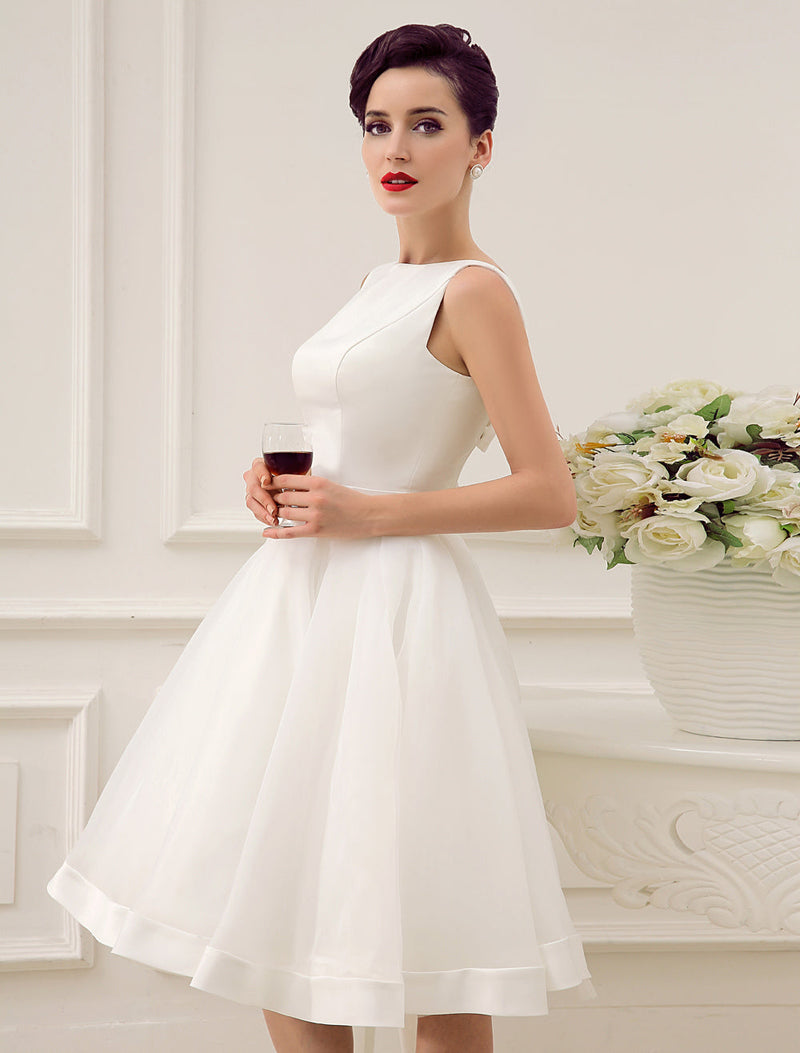 https://www.dbrbridal.com/cdn/shop/files/Exclusive-Short-Wedding-Dress-Retro-Bridal-Dress-Bateau-Sleeveless-Reception-Bridal-Gown-6_800x.jpg?v=1703295242