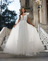 Glamorous Long White V-neck Sleeveless Bridal Gown With Lace